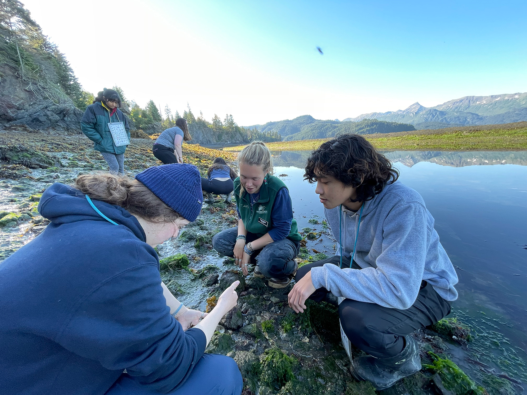 Students investigating water life in Alaska.