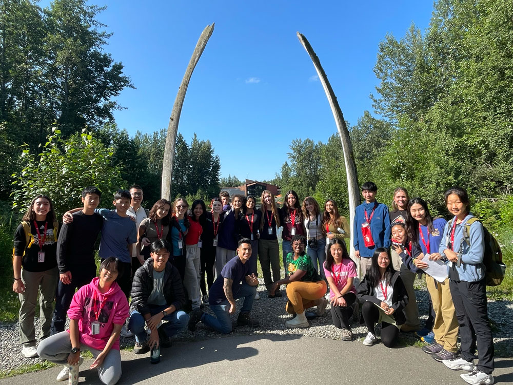 2023 cohort of BELL Alaska students posing in front of a landscape