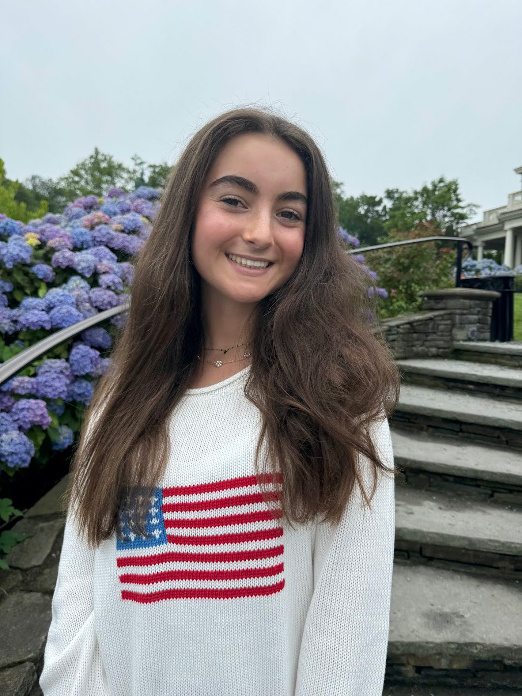 Samia Perez holding an award