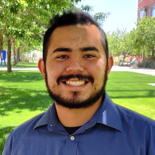 Headshot of Sebastian Curiel Ledesma with trees in the background