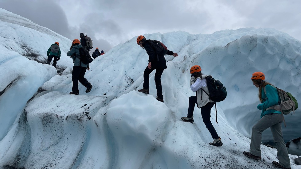 Students traversing an iceberg.
