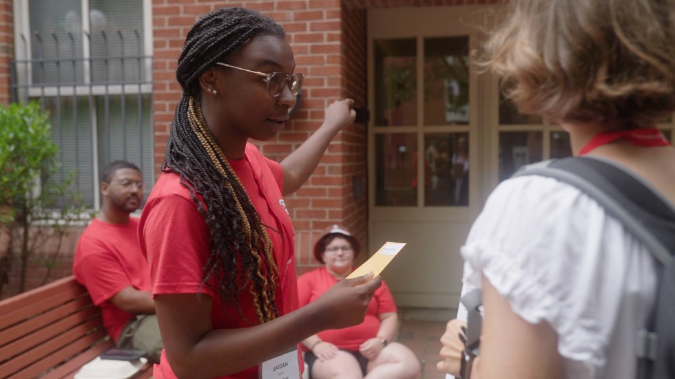 Staff helping with residence hall check-in.