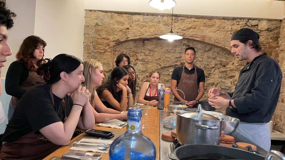 BEE Barcelona students taking a cooking class