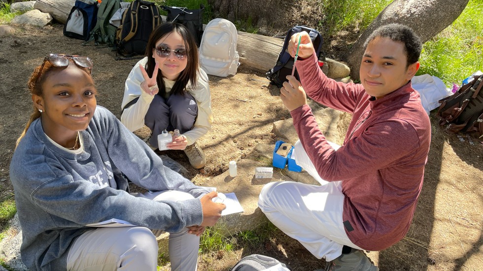 BELL students conducting research at a riverfront