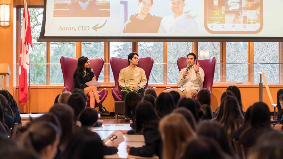 Panel of people on stage having a discussion