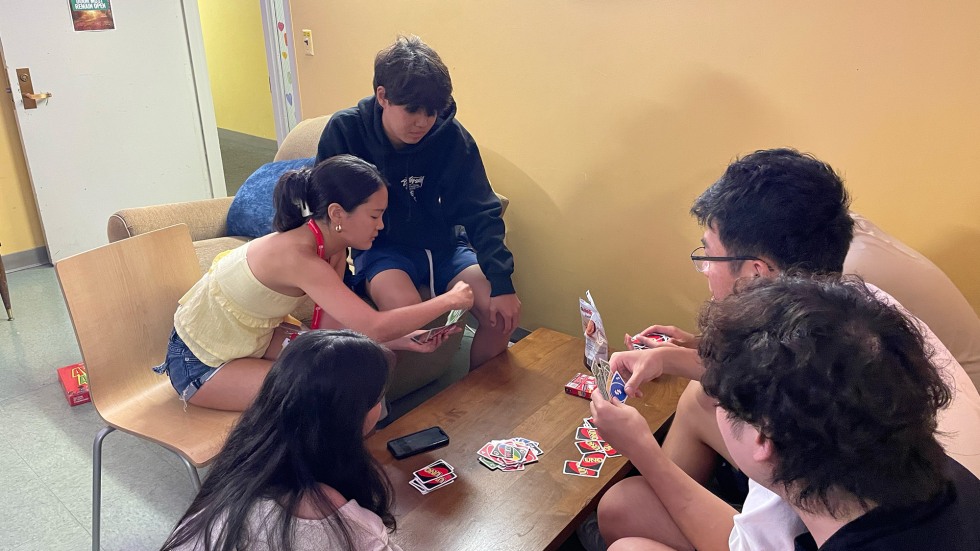 students playing a card game