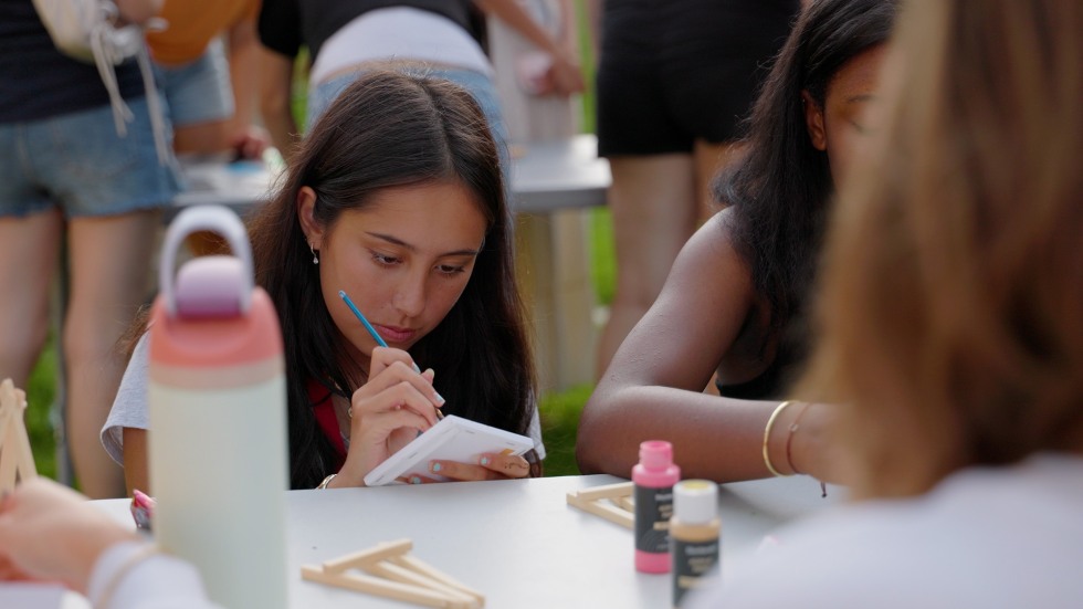 Student working on a painting activity