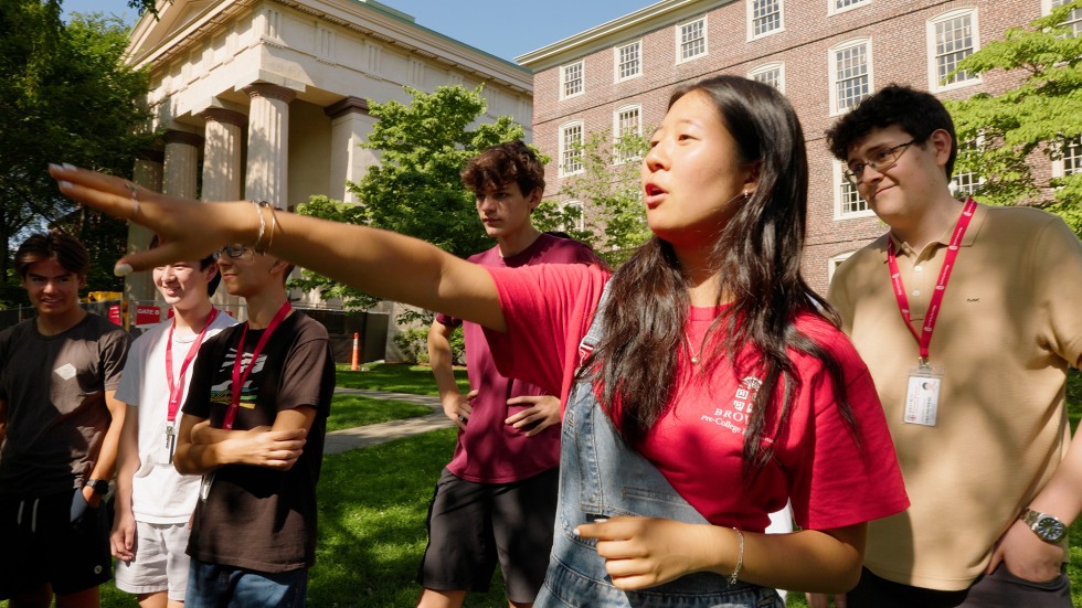Pre-College staff member directing students